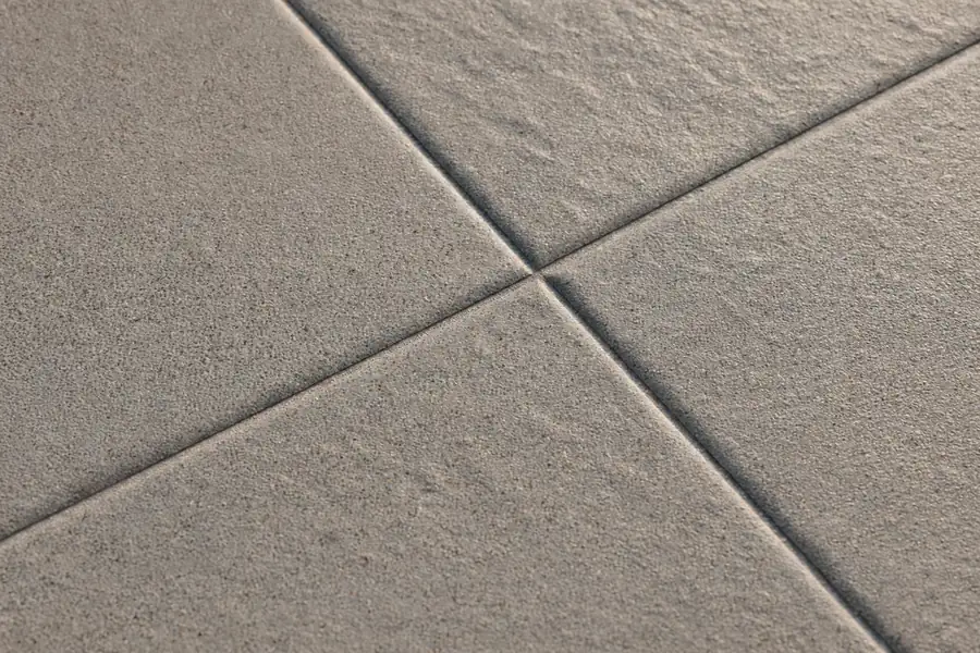 Textured stone-look outdoor porcelain tile for terraces and porches in Pakistan