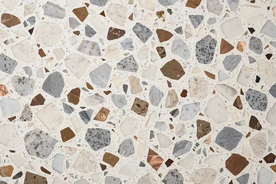 Ivory terrazzo-look porcelain tile with stone chips for floors in Pakistan